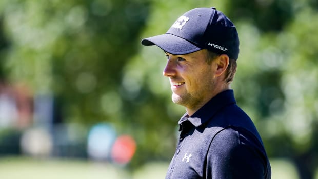 Jordan Spieth smiles on the 16th green during a practice round for the Charles Schwab Challenge golf tournament at Colonial Country Club.